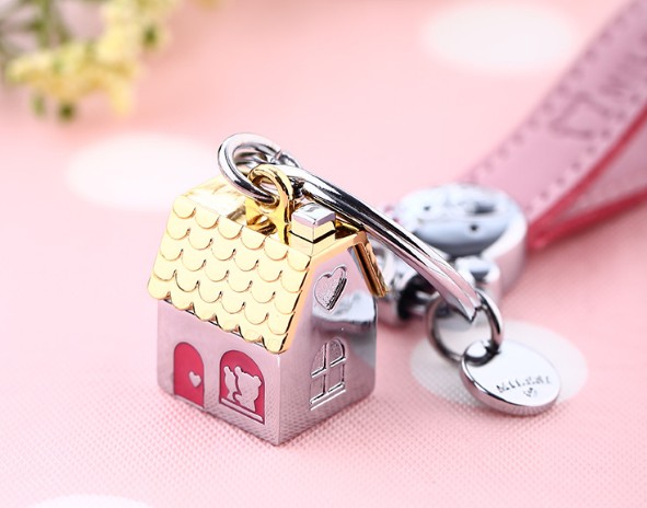 leather + zinc alloy house keychain