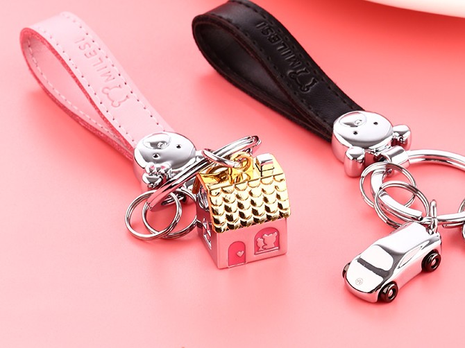 leather + zinc alloy house keychain