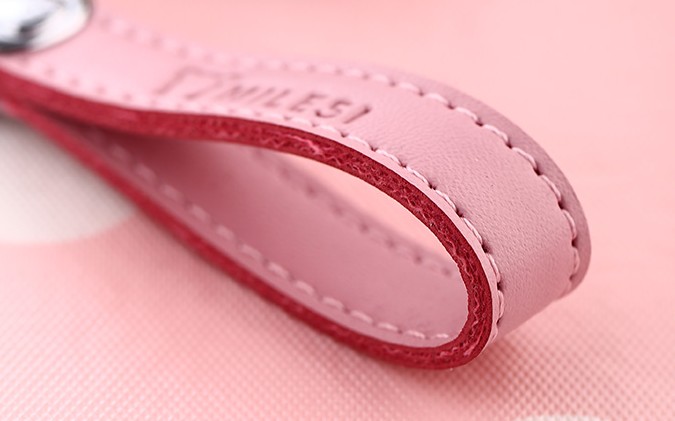 leather + zinc alloy house keychain