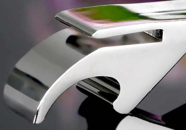 Saber tooth tiger bottle opener keychain