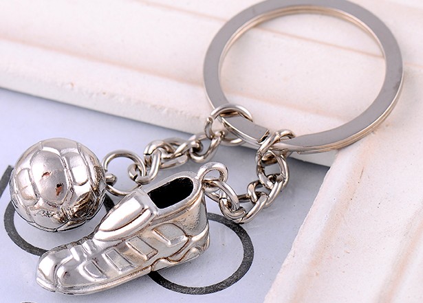 Football shoes and soccer keychain