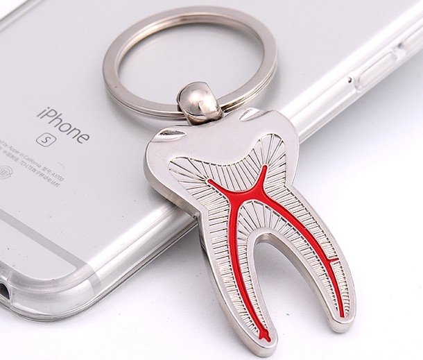 Tooth alloy keychain