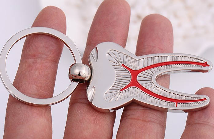 Tooth alloy keychain