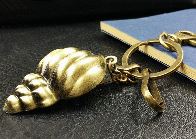 Bronze conch shell keychain