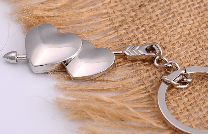Arrow through double heart keychain