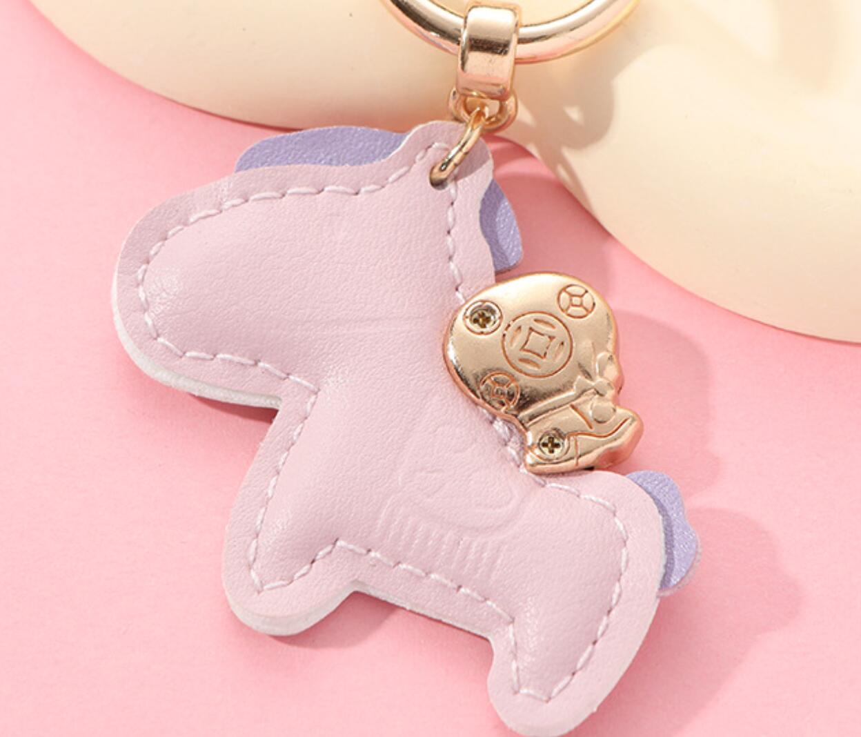Horses and money bag keychain