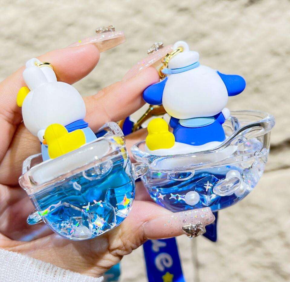 Flowing liquid boat and cartoon bear keychain