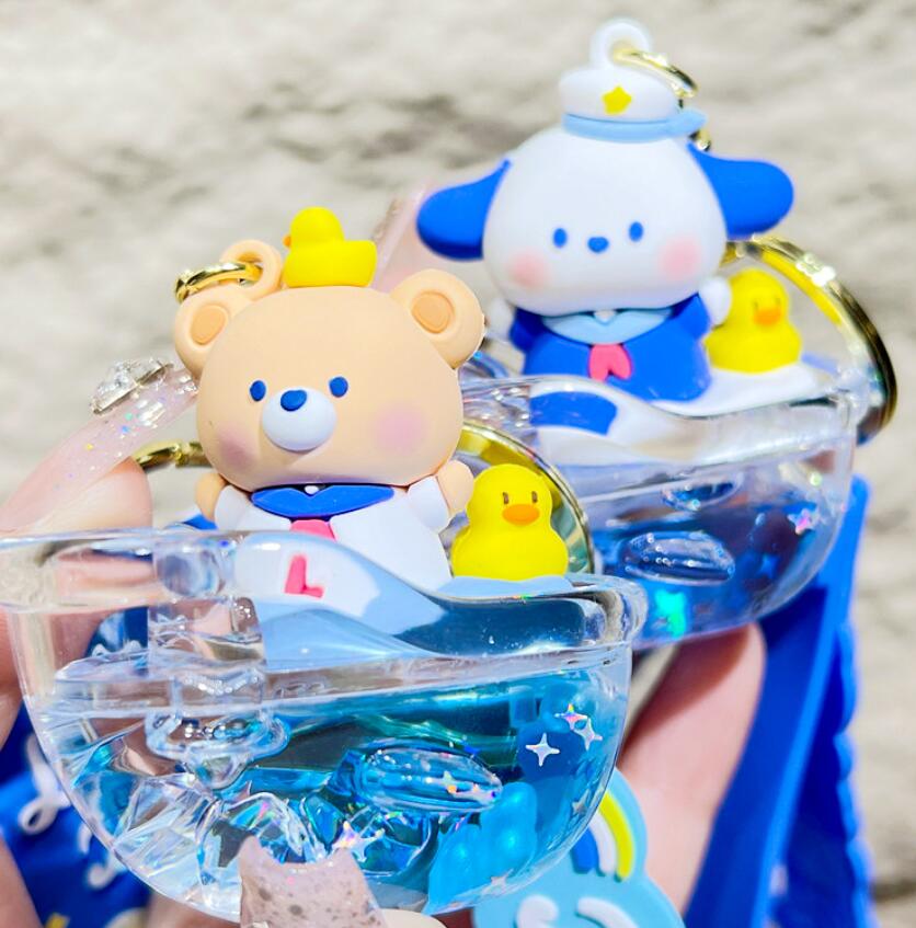 Flowing liquid boat and cartoon bear keychain