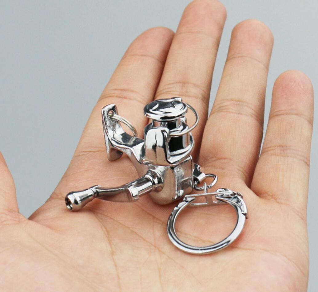 Shakeable fishing reel keychain