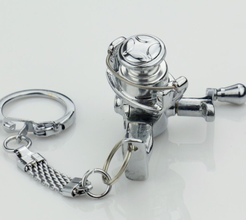 Shakeable fishing reel keychain