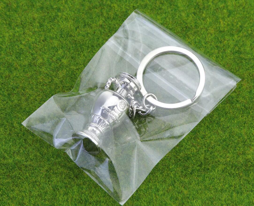 winners cup keychain